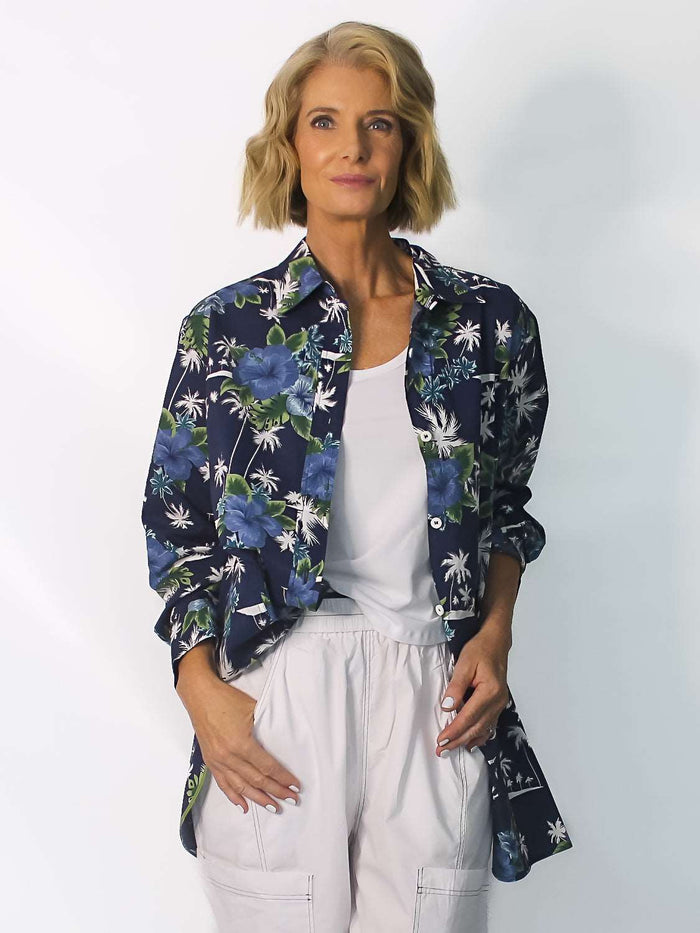 woman in navy tropical shirt